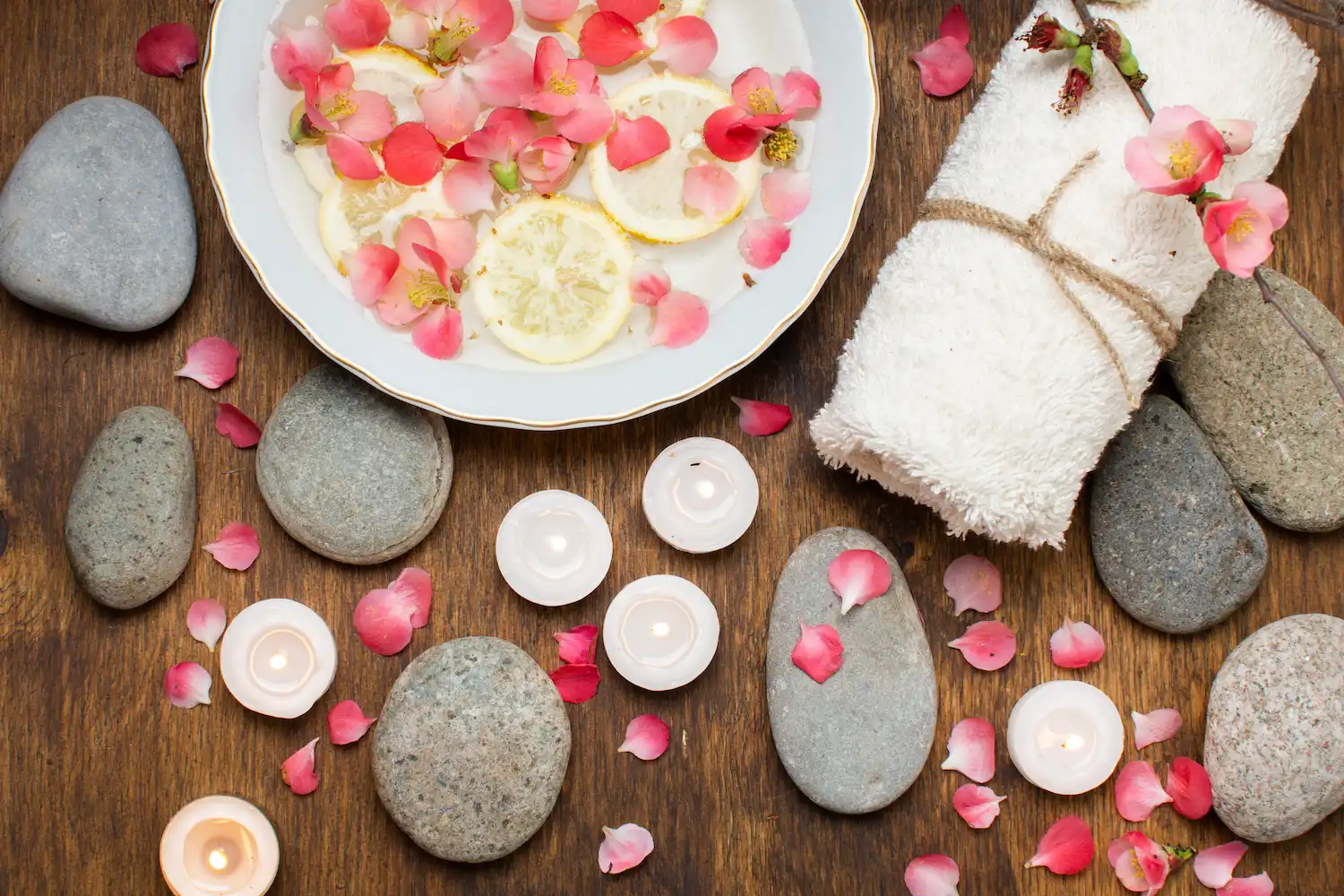 top view arrangement with pink petals stones